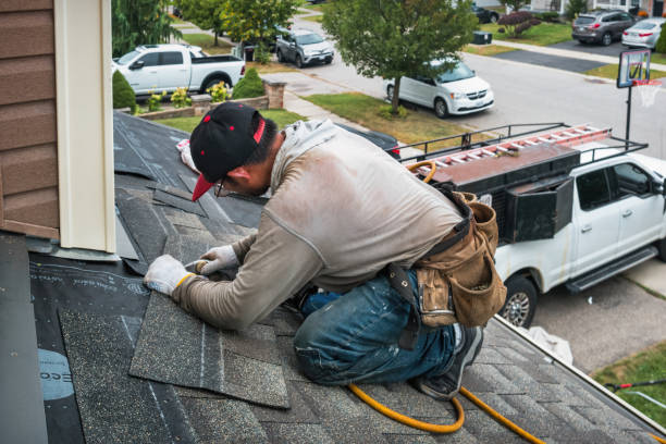 Professional Roofing technician working in Honeoye Falls, NY